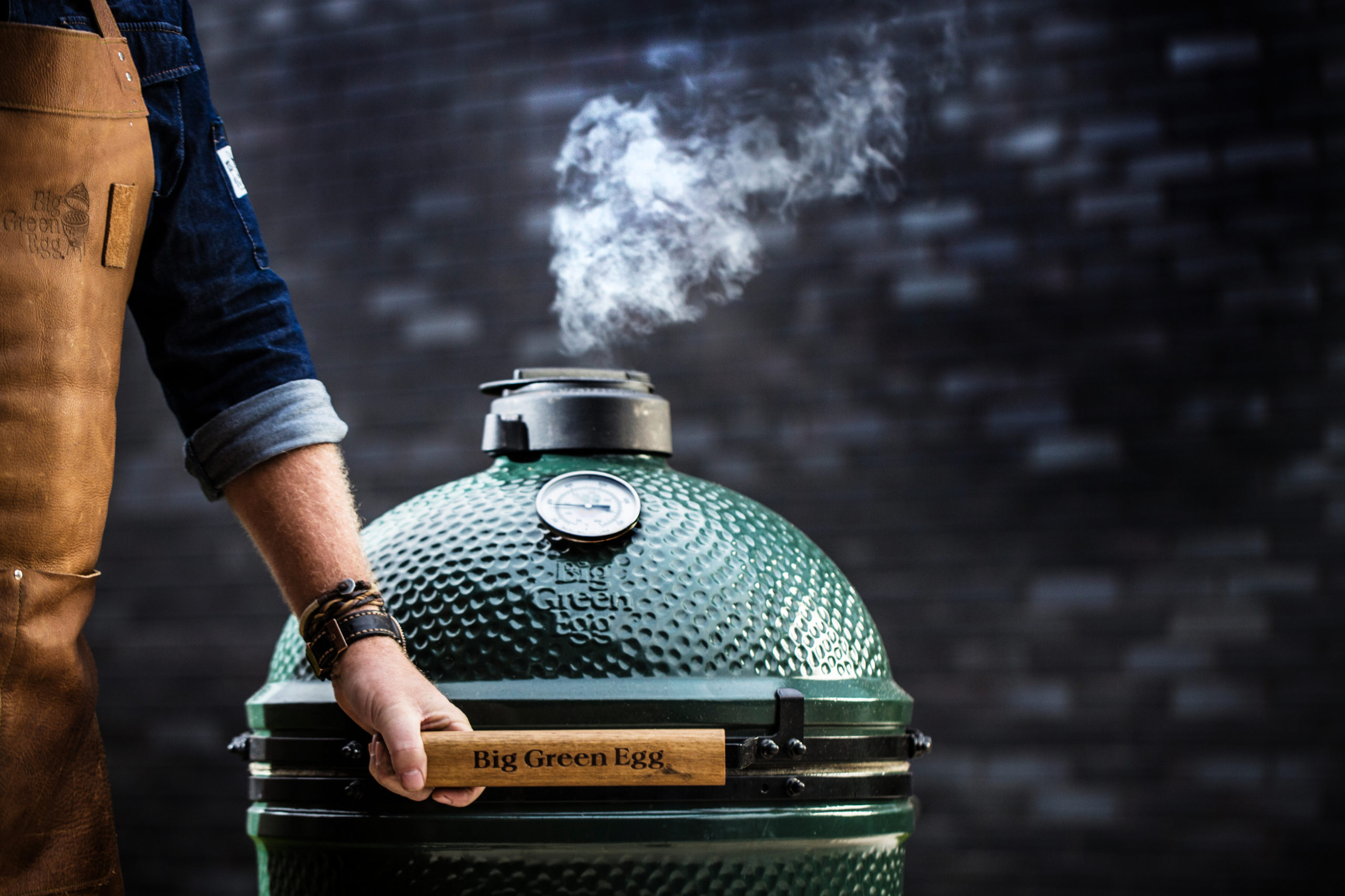 Hand_Opening Large Big Green Egg with Smoke-4320x2880